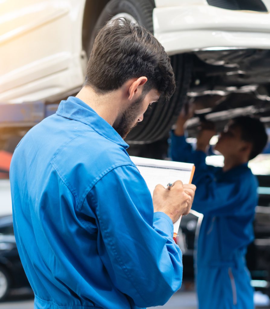 Mechanics inspecting a vehicle - Car Service Bilston